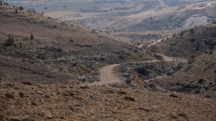 a path soil road between mountains 