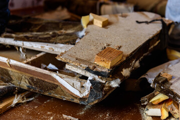 Getting rid of old things. Disassembling an old sofa in the attic.