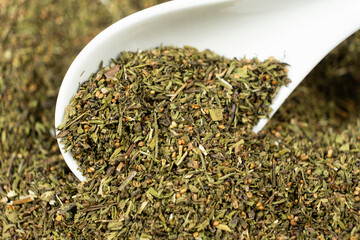 Savory herb seasoning in a spoon macro