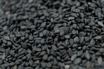 Healthy black sesame seeds textured background