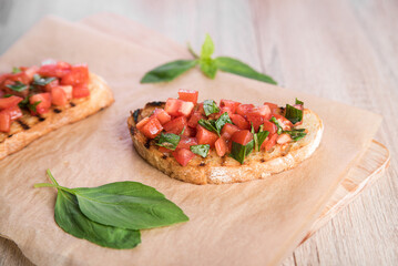 Bruschetta with tomatoes and basil prepared for breakfast