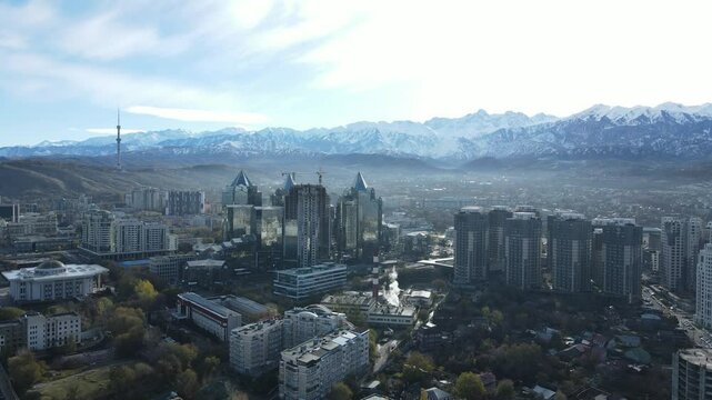 Almaty Cityscape with Smog Esentai Mall, Church, and Kok Tobe View winter