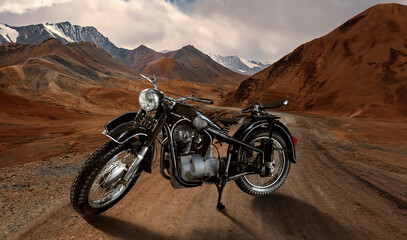 A black motorcycle is parked on a dirt road in the desert © Кристина Пахомова