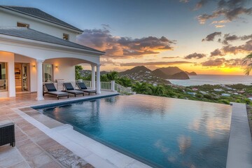 Fototapeta premium Serene Villa with Infinity Pool Overlooking Sunset Landscape
