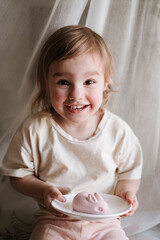 little girl and healthy easter sweets - jelly bunny