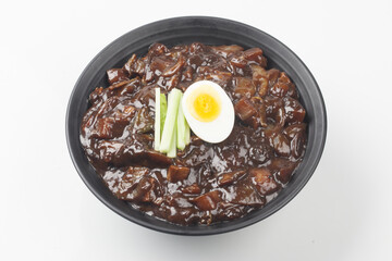 Jjajangmyeon is one of Chinese dishes. The noodles are mixed with Chinese soybean paste stir-fried with meat and vegetables.