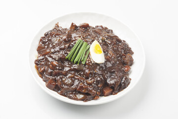 Jjajangmyeon is one of Chinese dishes. The noodles are mixed with Chinese soybean paste stir-fried with meat and vegetables.