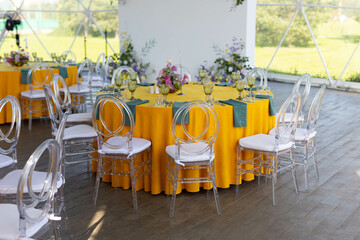 bright yellow banquet table decoration at the celebration