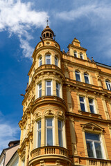 Fototapeta premium A tall building standing majestically with a blue sky in the background