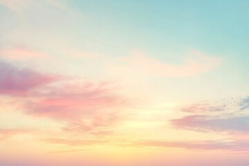 Fototapeta premium Pastel sunset sky with soft clouds.