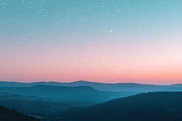 Fototapeta premium Serene pastel sunset over mountain range.