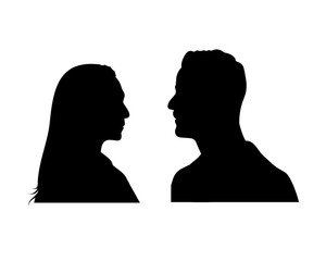 Silhouette of couple man and woman arguing, talking to each other. Profile portrait of teo adults.