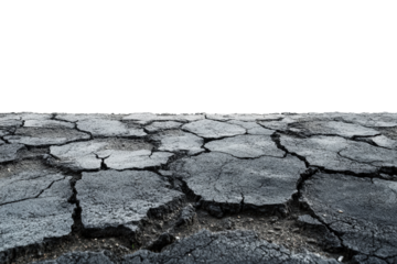 Cracked Road Surface: Close-up of a cracked asphalt road surface, revealing the intricate network of fissures and damage.