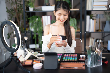 beauty blogger Young Asian girl makeup artist Professional Woman blogger vlogger is showing...