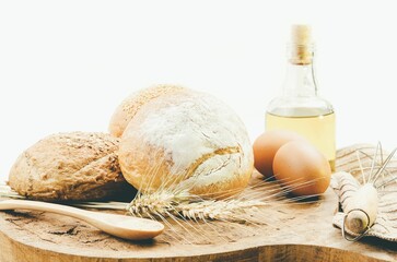 fresh bread and wheat on the wooden