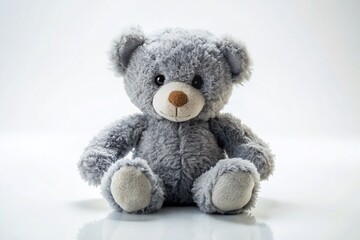 Obraz premium Isolated Gray Plush Bear Toy on White Background - Minimalist Photography