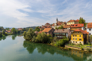 Naklejka premium Scenic view of picturesque village Novo mesto along Krka river in Dolenjska region in Slovenia