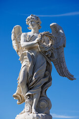 Obraz premium Angel with the Crown of Thorns by Gian Lorenzo Bernini and son Paolo on Ponte Sant'Angelo - Rome - Italy