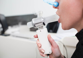 unrecognizable patient having lung function test at hospital