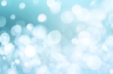 Fototapeta premium abstract background of sparkling bokeh lights in soft blue and white tones, creating a dreamy atmosphere 
