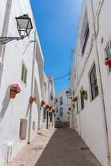 narrow street of mediterranean white village
