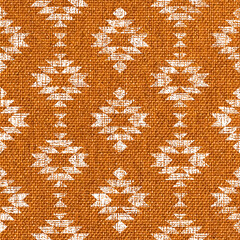 Block print Aztec diamonds orange burlap texture seamless pattern, textured tribal Southwestern Aztec geometrics on fabric texture background.