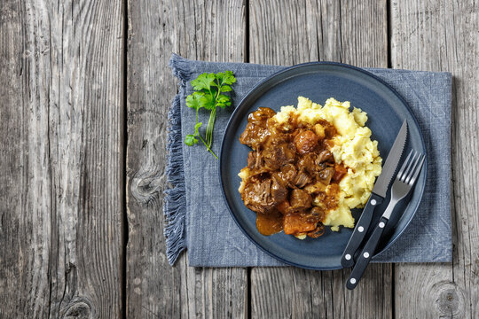 tender red wine braised beef with mashed potato