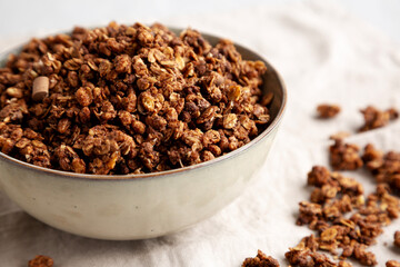 Homemade Healthy Chocolate Granola in a Bowl, side view. Close-up.