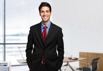 Fototapeta premium Confident businessman in office environment