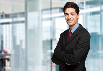 Fototapeta premium Confident businessman in modern office setting