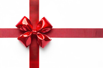 Stock photo of a red bow tied and crossed in the form of a gift wrap on a white background. The high-contrast composition ensures a striking visual impact, perfect for advertisements, packaging design