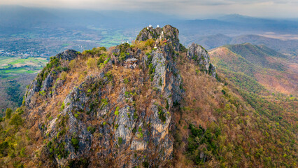 Aerial view of Thailand Sky Temple, Wat Chaloem Phra Kiat is Buddhist Temple which has been built at the very top of a mountain peak in Lampang 