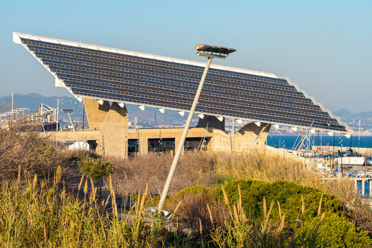 Large solar panel structure at Marina Port Forum in Barcelona, symbolizing renewable energy and urban sustainability.