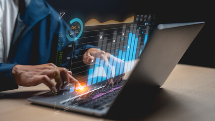 A person interacts with a laptop displaying animated data visualizations and charts, showcasing a digital analysis process.