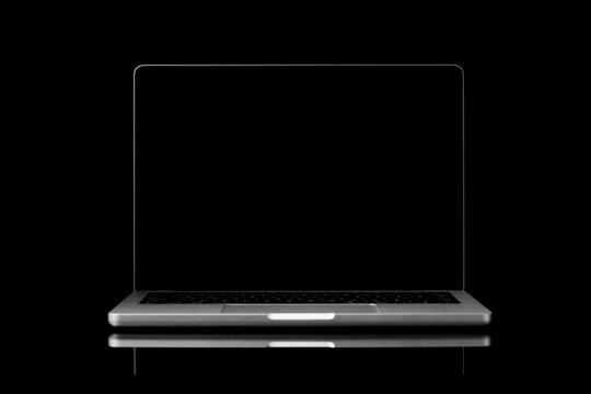 Laptop with a blank screen isolated on a black background