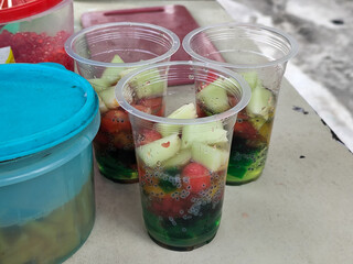 Fruit Soup or Fruit Ice is a mixture of fruit with coconut or simple syrup, served with ice and...