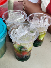 Fruit Soup or Fruit Ice is a mixture of fruit with coconut or simple syrup, served with ice and...