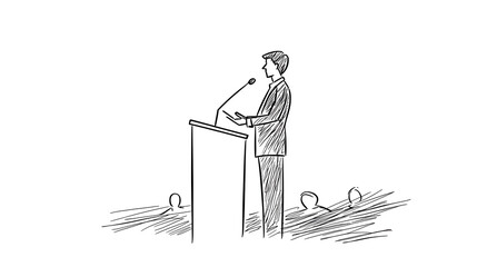 A man stands at a podium with a microphone