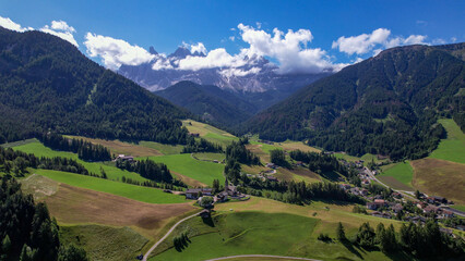 The Odle  Group mountain peaks and the church of Santa Maddalena in the Valley of Funes, South Tyrol in northern Italy. The church is dedicated to St. Magdalene.