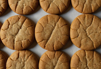 Close-up of cookies arranged in rows, showing their patterns and texture