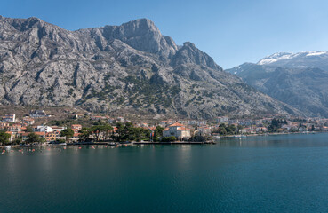 View of the small town of Dobrota with a backdrop of  mountains in Kotor bay, Montenegro