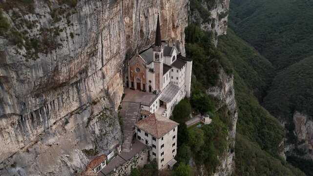 Sanctuary of Madonna della Corona: suspended between heaven and earth, where faith meets the majesty of nature. Italy 