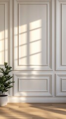Fototapeta premium Elegant interior showcasing classic wall paneling with sunlight and a potted plant creating a bright and inviting atmosphere for modern living
