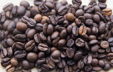 Coffee beans, roasted coffee beans scattered