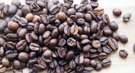Coffee beans, roasted coffee beans scattered