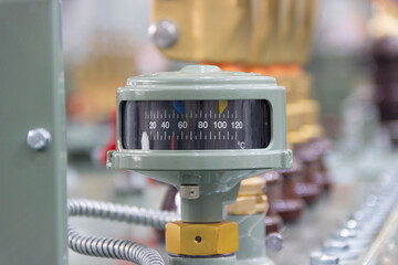 Oil pressure sensor in high current transformer