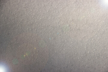 Background texture of technical paper with backlighting at the corners