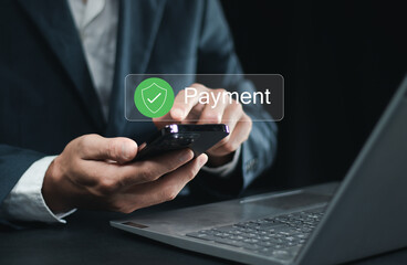 .Mobile Payment Security Protection. Businessman using a smartphone for secure online payment,...