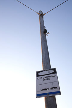 Beware of live wires sign for boating launch