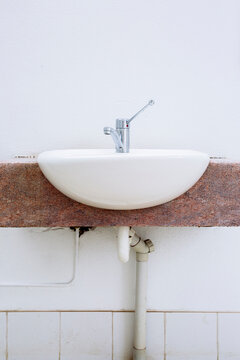 Sink in an outdoor public toilet.